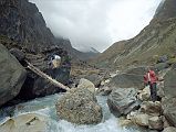 203 Log Across Miristi Khola Not much has changed since 1950. �An attempt to wade the torrent gave rise to some picturesque scenes, with a cowboy Lachenal lassooing coolies as they were swept away. Eventually we solved the problem with an improvised bridge of branches� (Lionel Terray, Conquistadors of the Useless).